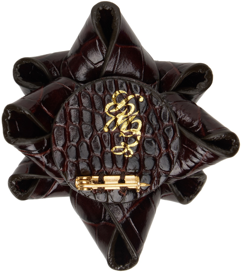 Ernest W. Baker Brown Leather Present Brooch