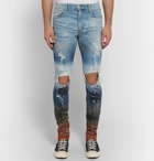 AMIRI - Thrasher Skinny-Fit Distressed Printed Stretch-Denim Jeans - Men - Light denim