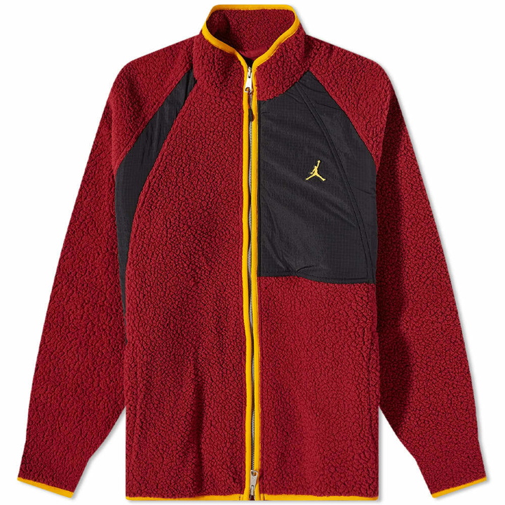 Photo: Air Jordan Men's Essential Fleece Winter Top in Cherrywood Red/Black Taxi