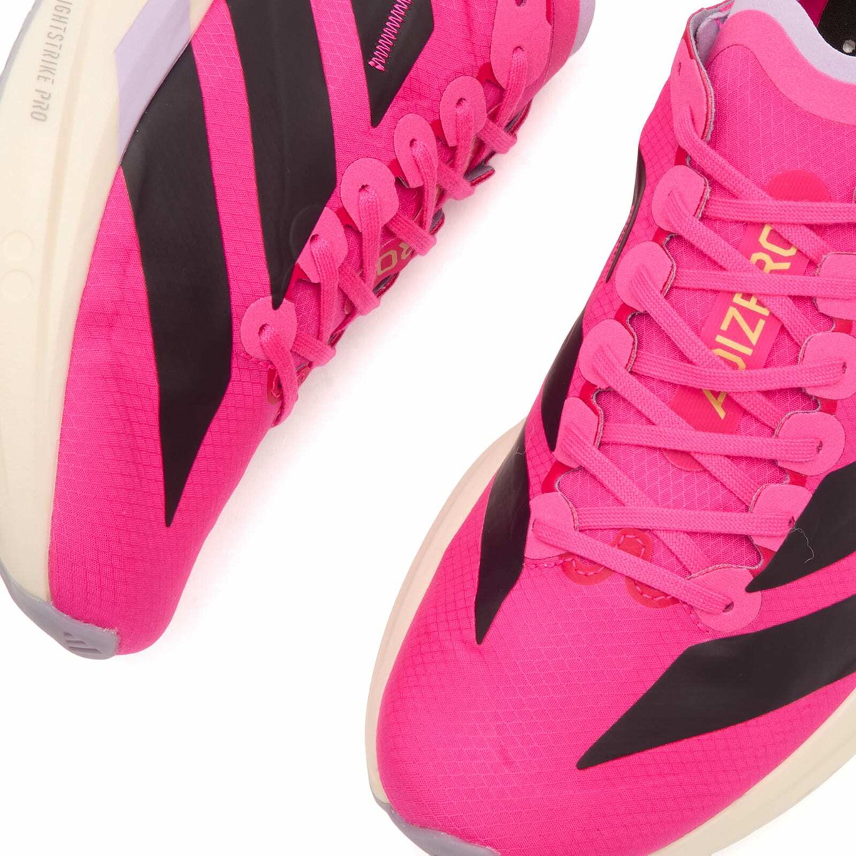 Adidas Adizero Takumi Sen 11 Sneaker in Shock Pink/Aurora Black/Powder Plum