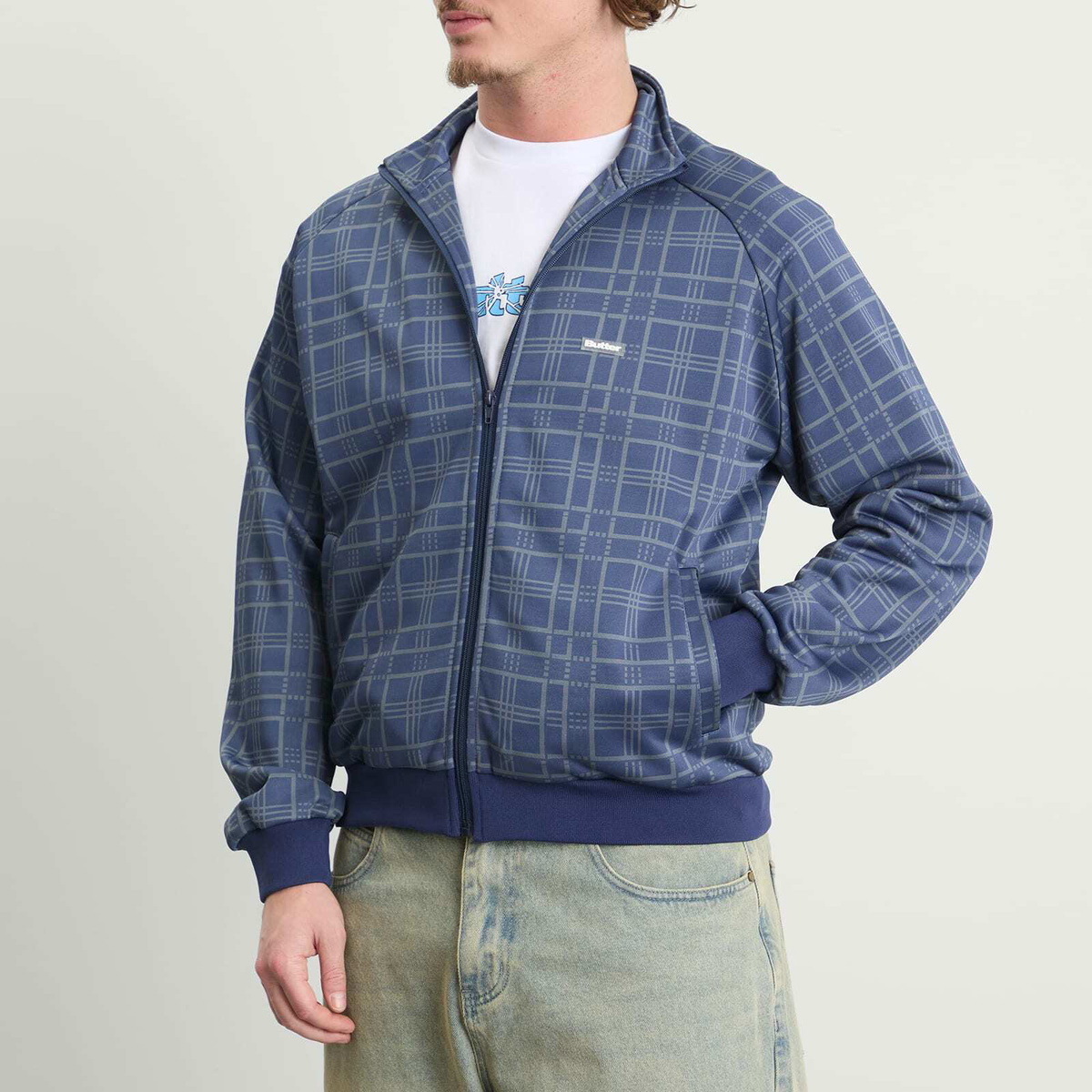 Butter Goods Men's Tricot Track Jacket in Navy Plaid