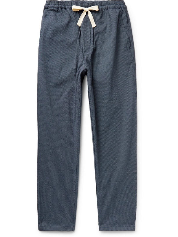 Photo: HOWLIN' - Tropical Pinstriped Cotton-Blend Seersucker Drawstring Trousers - Blue