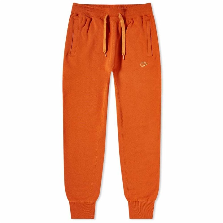 Photo: Nike Men's Heavyweight Classic Sweat Pant in Sport Spice/Hot Curry