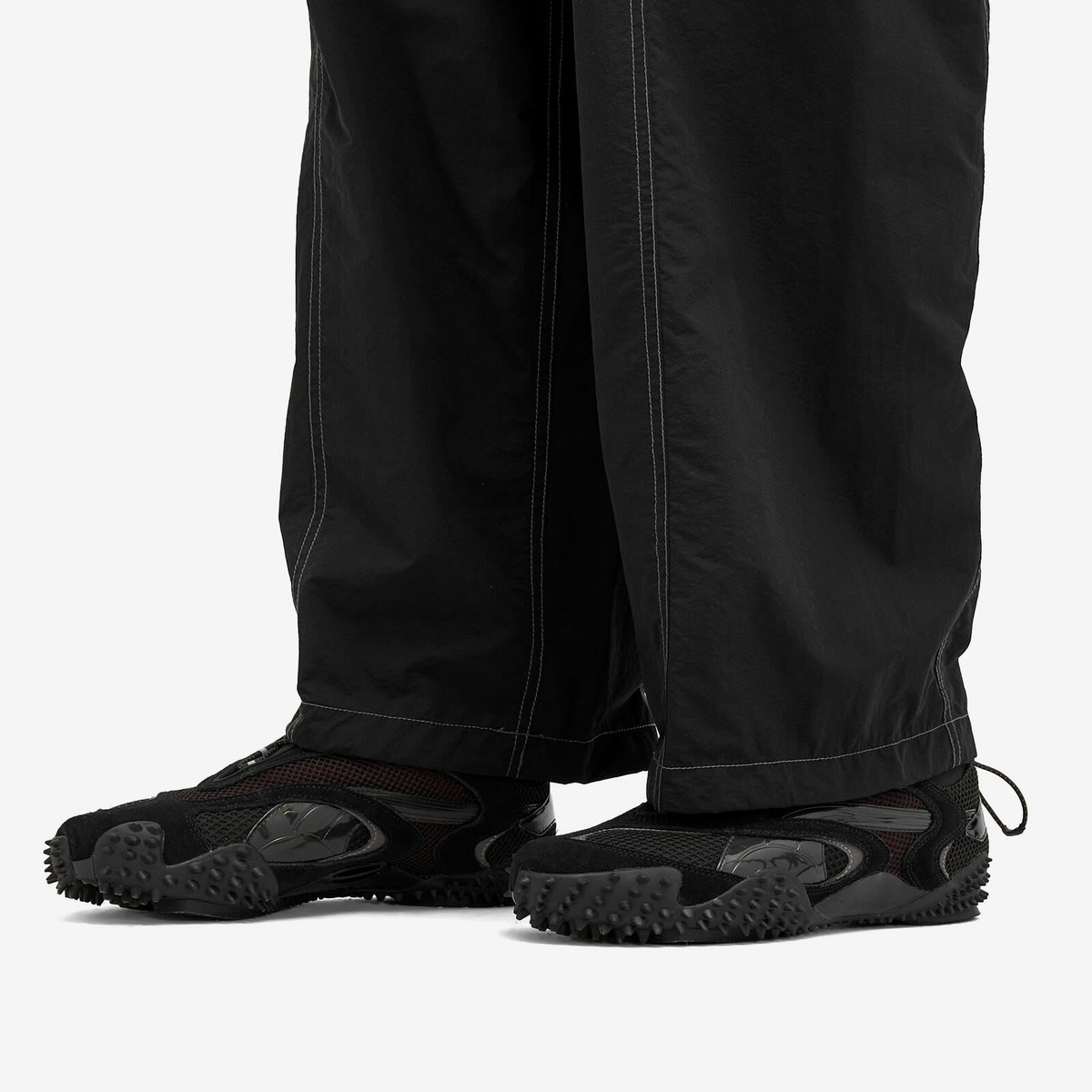 Puma Mostro Nu Aries Arise in Puma Black/Dark Jasper Puma