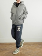 SAINT MXXXXXX - Tapered Logo-Print Cotton-Blend Jersey Sweatpants - Blue