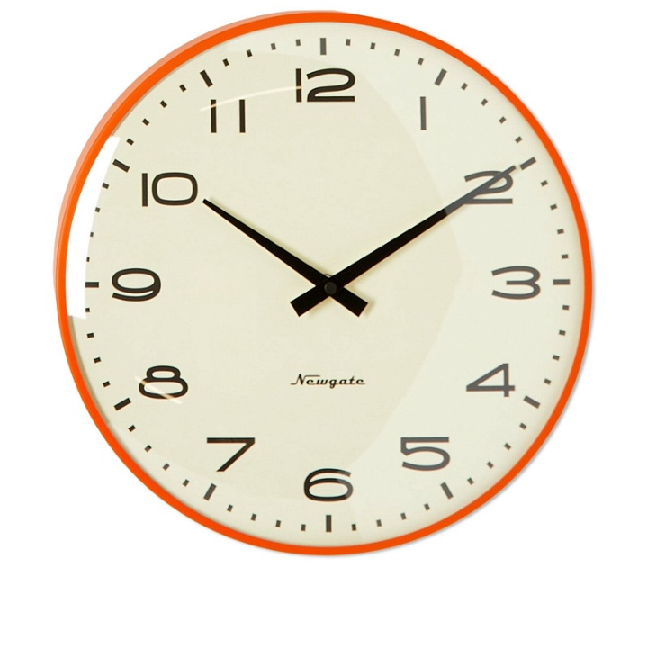 Photo: Newgate Clocks Radio City Harlem Dial Wall Clock in Orange