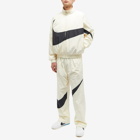 Nike Men's Swoosh Woven Track Jacket in Coconut Milk/Black