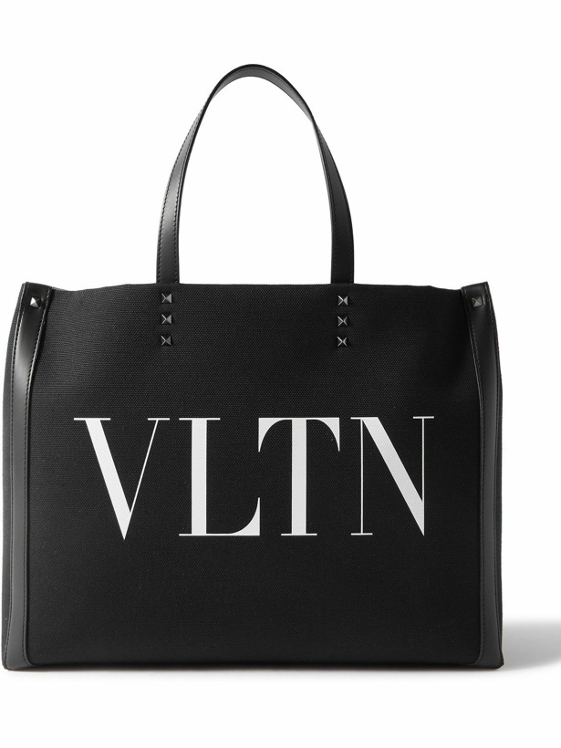 Photo: Valentino Garavani - Medium Studded Leather-Trimmed Logo-Print Canvas Tote Bag