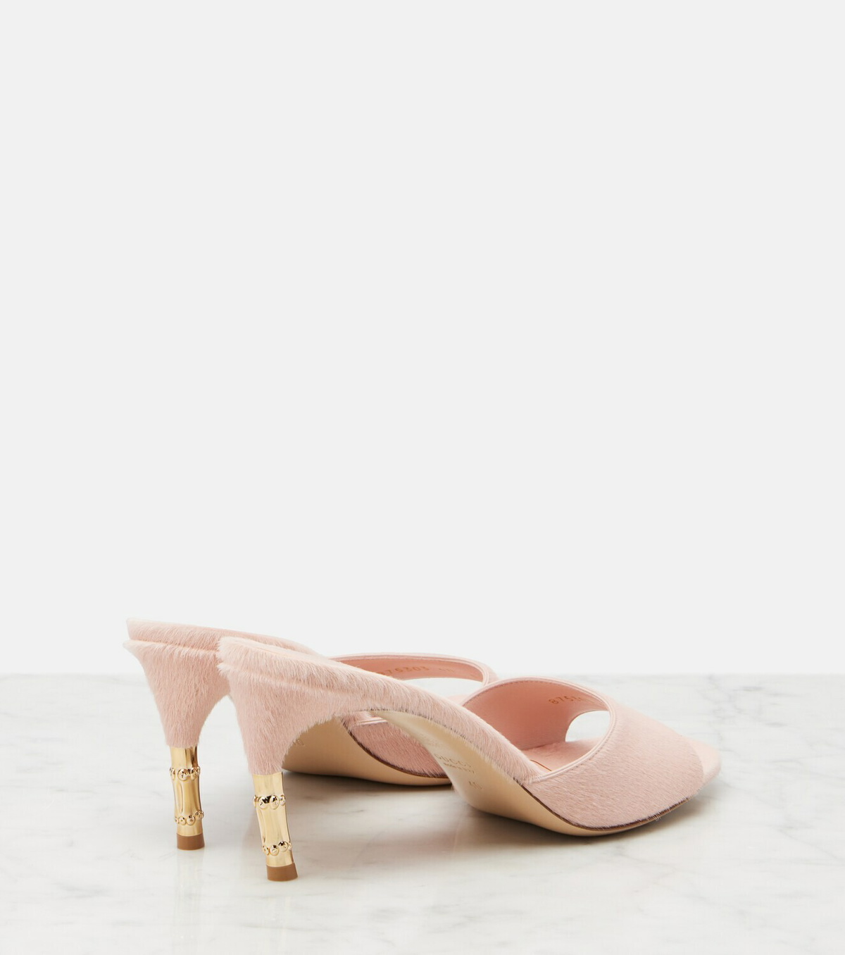 Gucci Castello calf hair mules