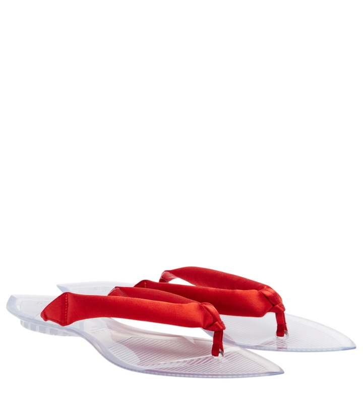 Photo: Alaïa Invisible satin thong sandals