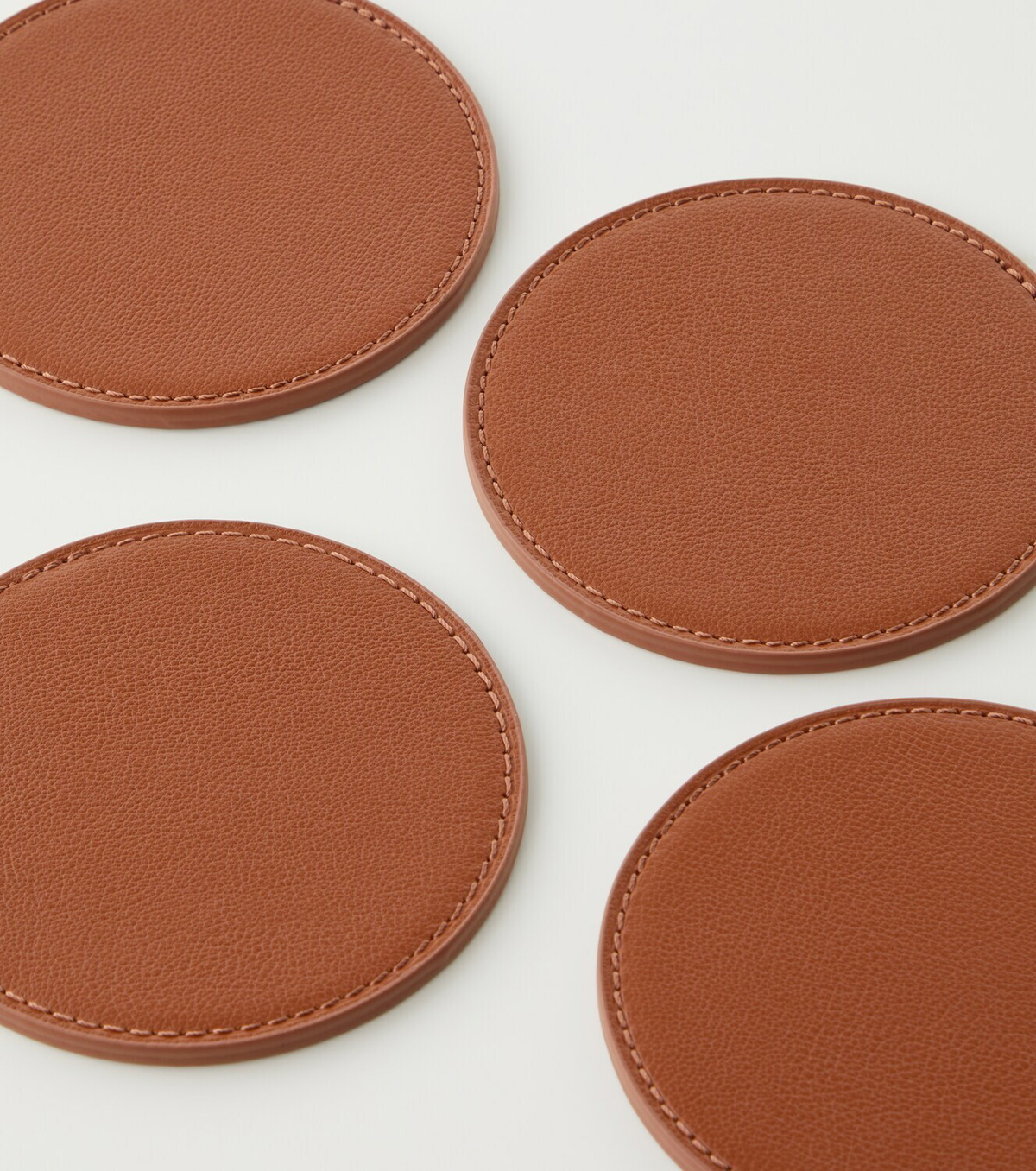 Georg Jensen Sky set of 4 leather coasters by Aurélien Barbry