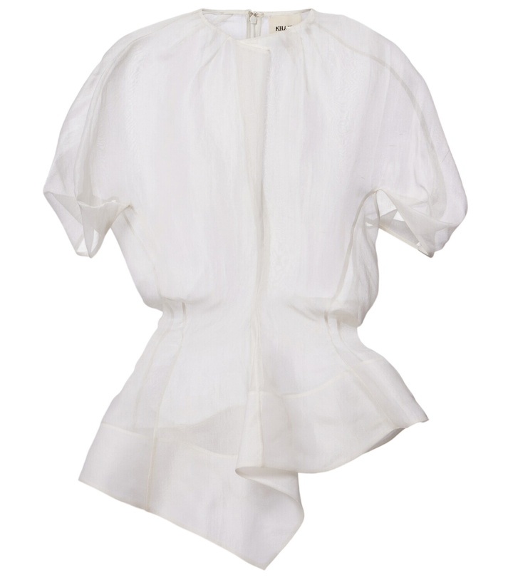 Photo: Khaite Rumi sheer peplum silk top