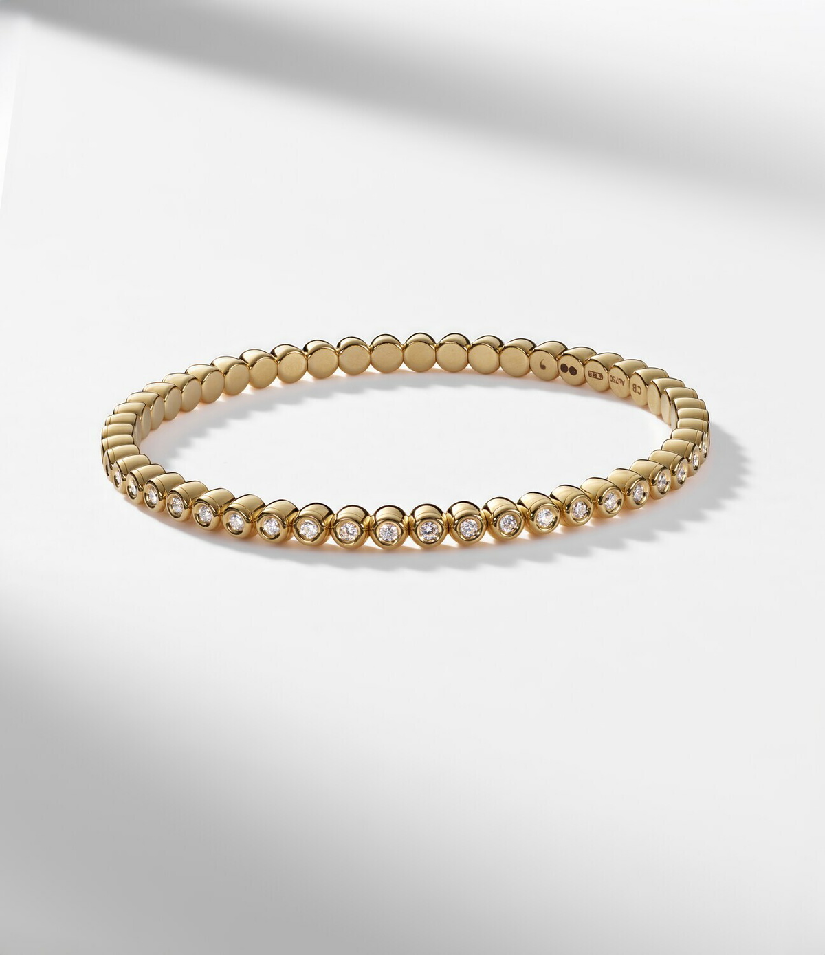 Bucherer Fine Jewellery Stretchy 18kt gold bracelet with diamonds