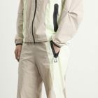 Nike Men's Tech Woven Pro Oversized Pant in Cream/Volt Tint/Black