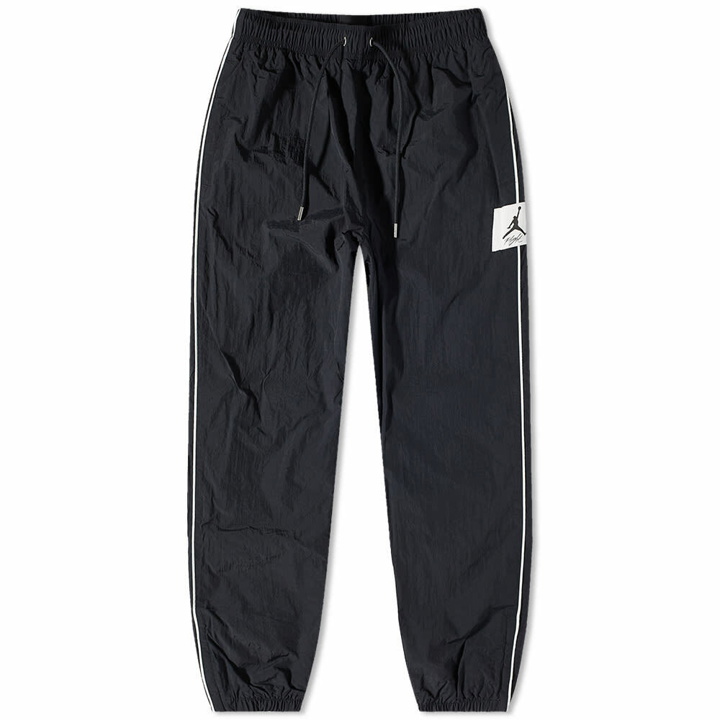 Photo: Nike Men's Air Jordan Essential Statement Warmup Pant in Black/Sail