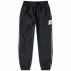 Nike Men's Air Jordan Essential Statement Warmup Pant in Black/Sail