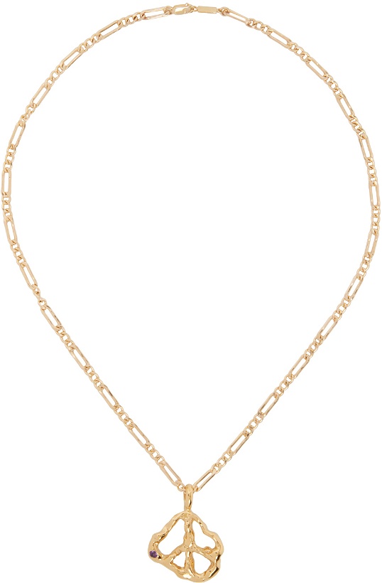 Photo: FARIS SSENSE Exclusive Gold Peace Pendant Necklace
