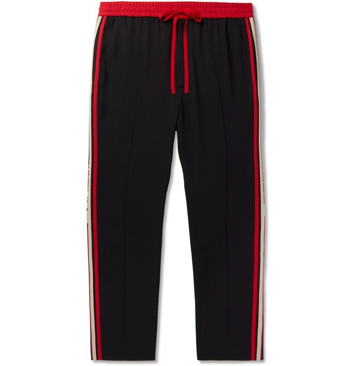 Photo: Gucci - Tapered Logo Webbing-Trimmed Woven Drawstring Trousers - Men - Black