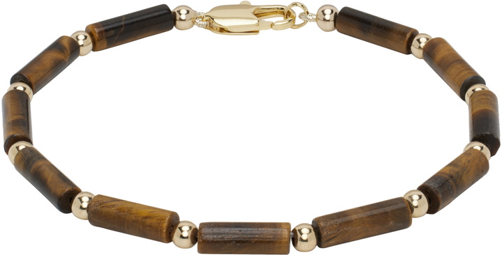 Photo: éliou SSENSE Exclusive Brown & Gold Felix Bracelet