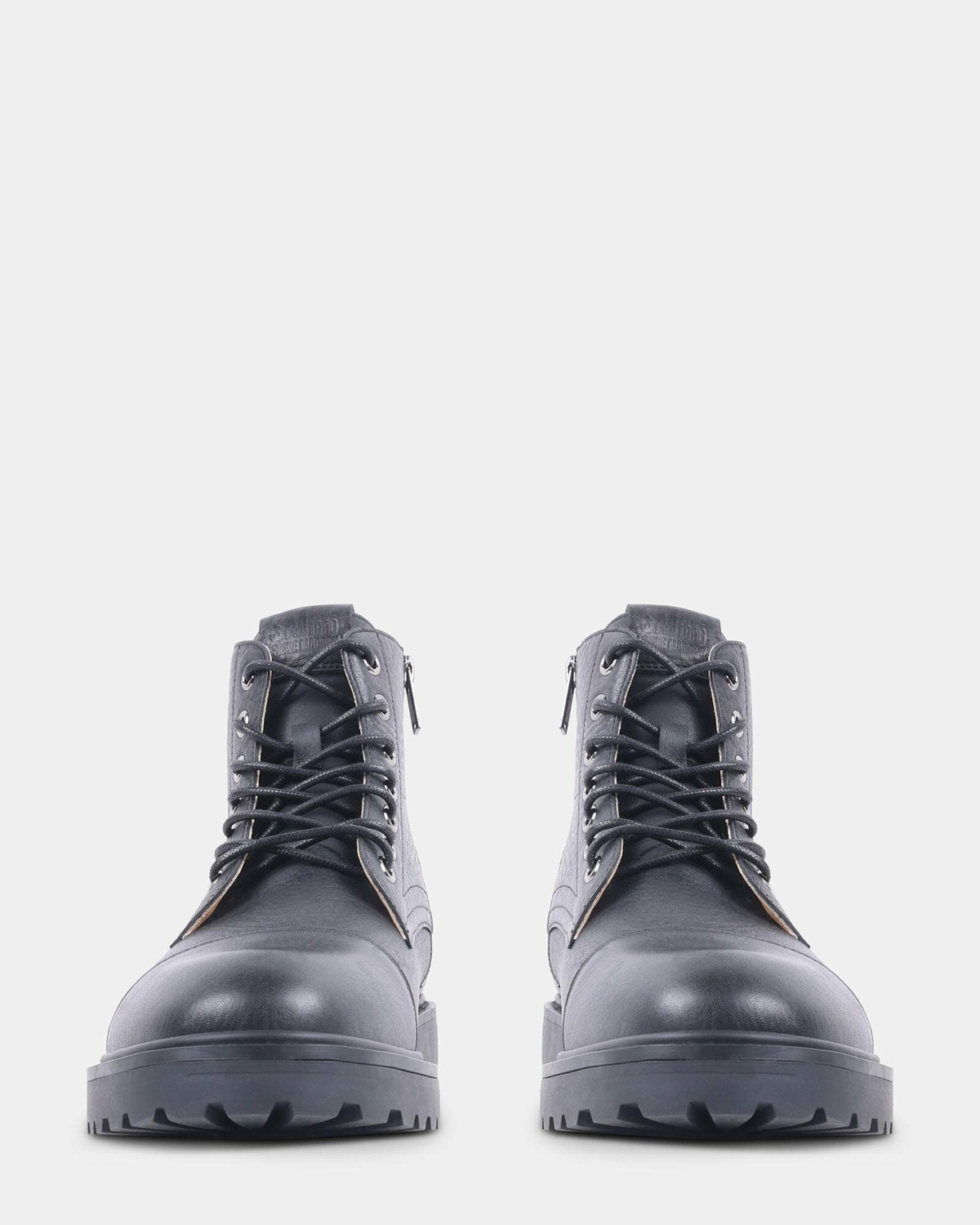 Steve Madden Uggo Boots in Black