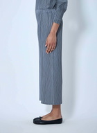 Pleats Please Issey Miyake Pleated Wide-Leg Trousers