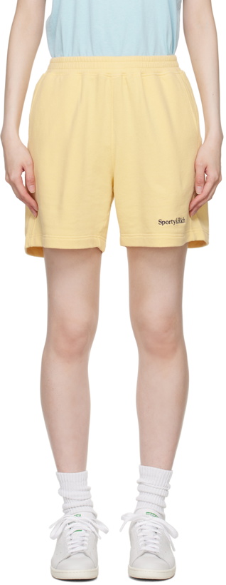 Photo: Sporty & Rich Yellow Serif Logo Gym Shorts