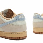 Nike Men's Dunk Low Sneakers in Coconut Milk/Armory Blue/Brown
