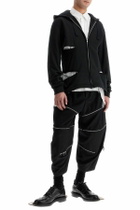 COMME DES GARCONS BLACK cropped pants with zip openings. Black