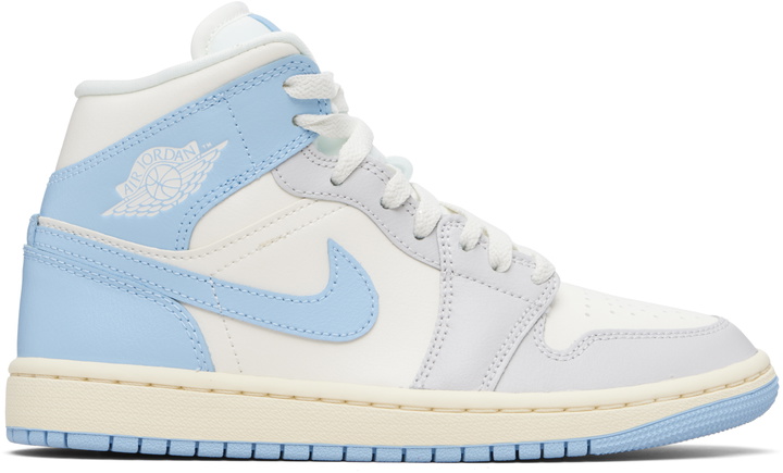 Photo: Nike Jordan White & Blue Air Jordan 1 Mid Sneakers