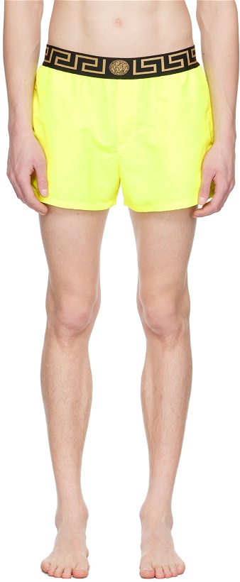 Photo: Versace Underwear Yellow Greca Border Swim Shorts