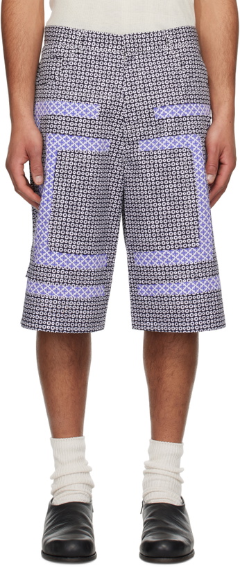 Photo: Edward Cuming SSENSE Exclusive Navy Flower Bermuda Shorts