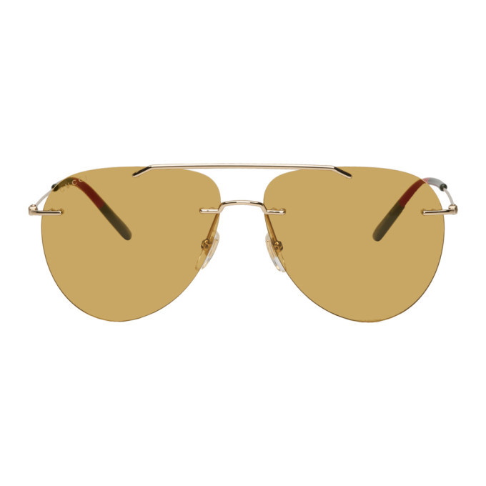 Photo: Gucci Gold Rimless Pilot Sunglasses
