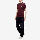 Moncler Men's Classic Logo Polo Shirt in Burgundy