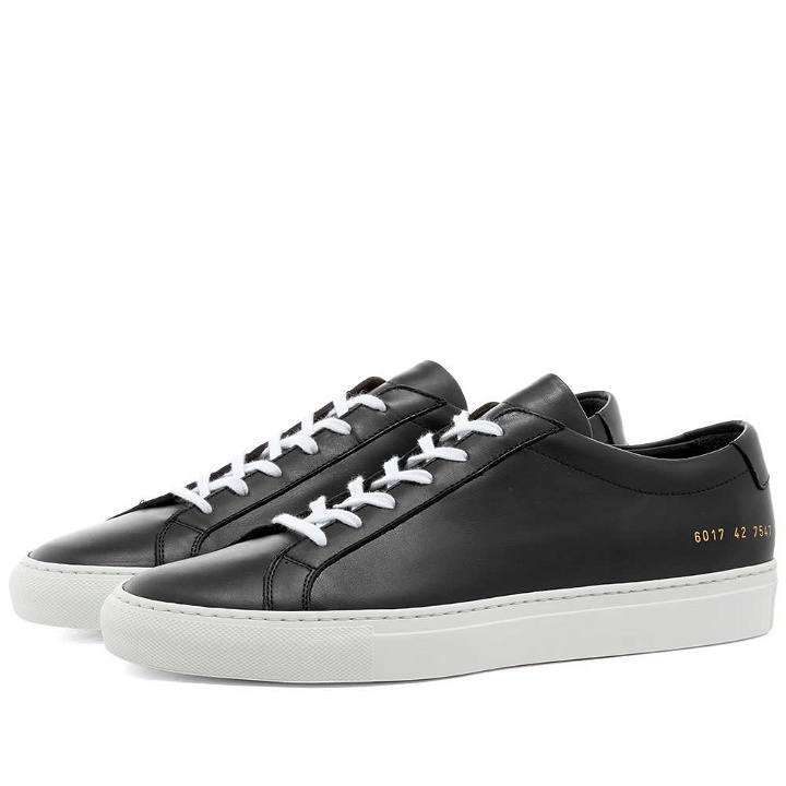 Photo: Woman by Common Projects Achilles Low White Sole