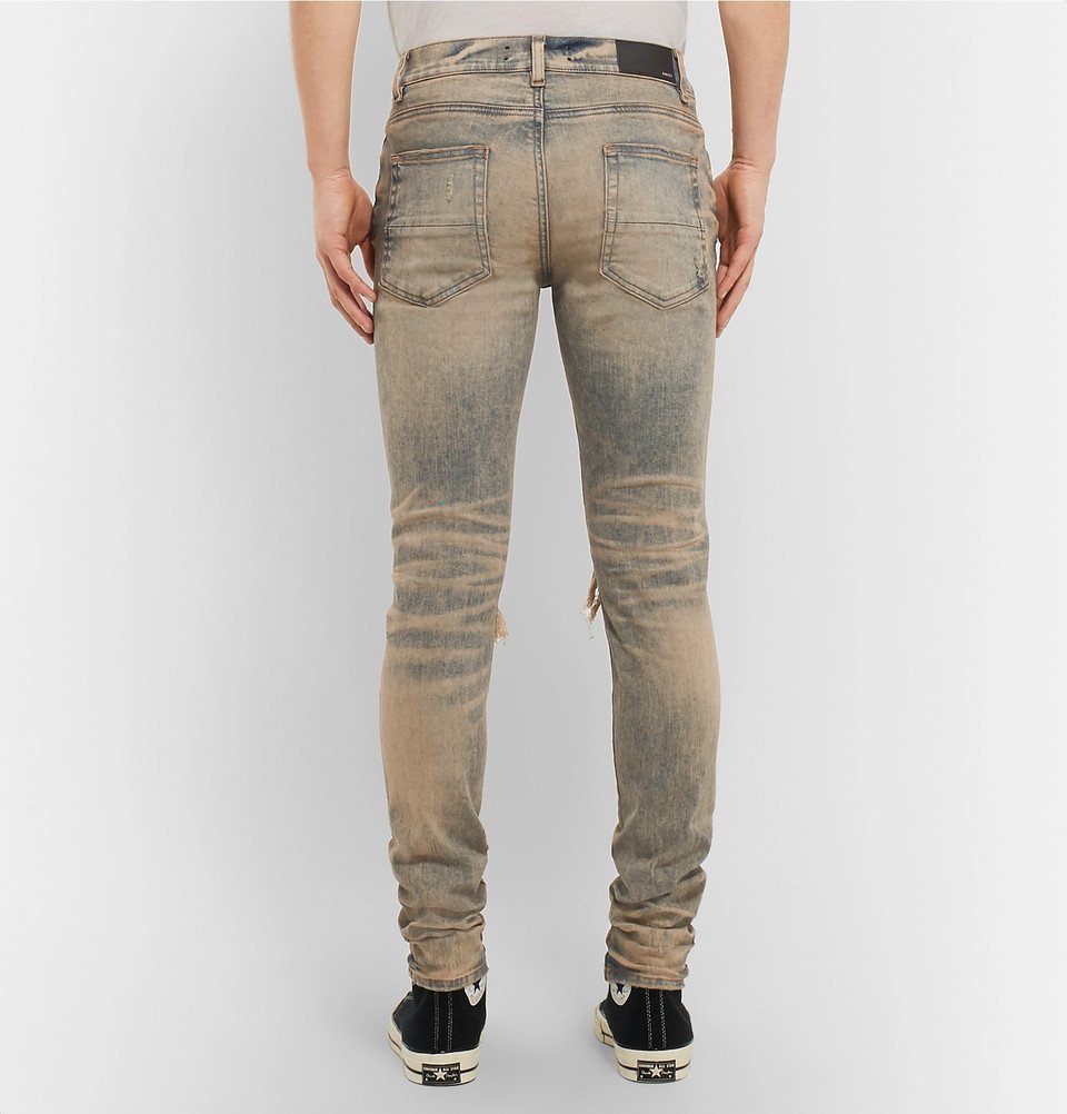 AMIRI - MX1 Skinny-Fit Panelled Distressed Stretch-Denim Jeans - Men - Blue