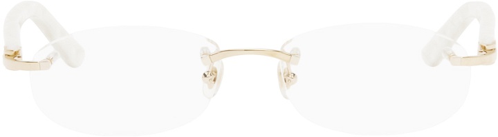 Photo: Cartier Gold Oval Glasses