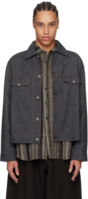 Photo: Aviva Jifei Xue Navy Trucker Denim Jacket
