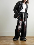 RRR123 - Logo-Print Cotton-Jersey Sweatpants - Black