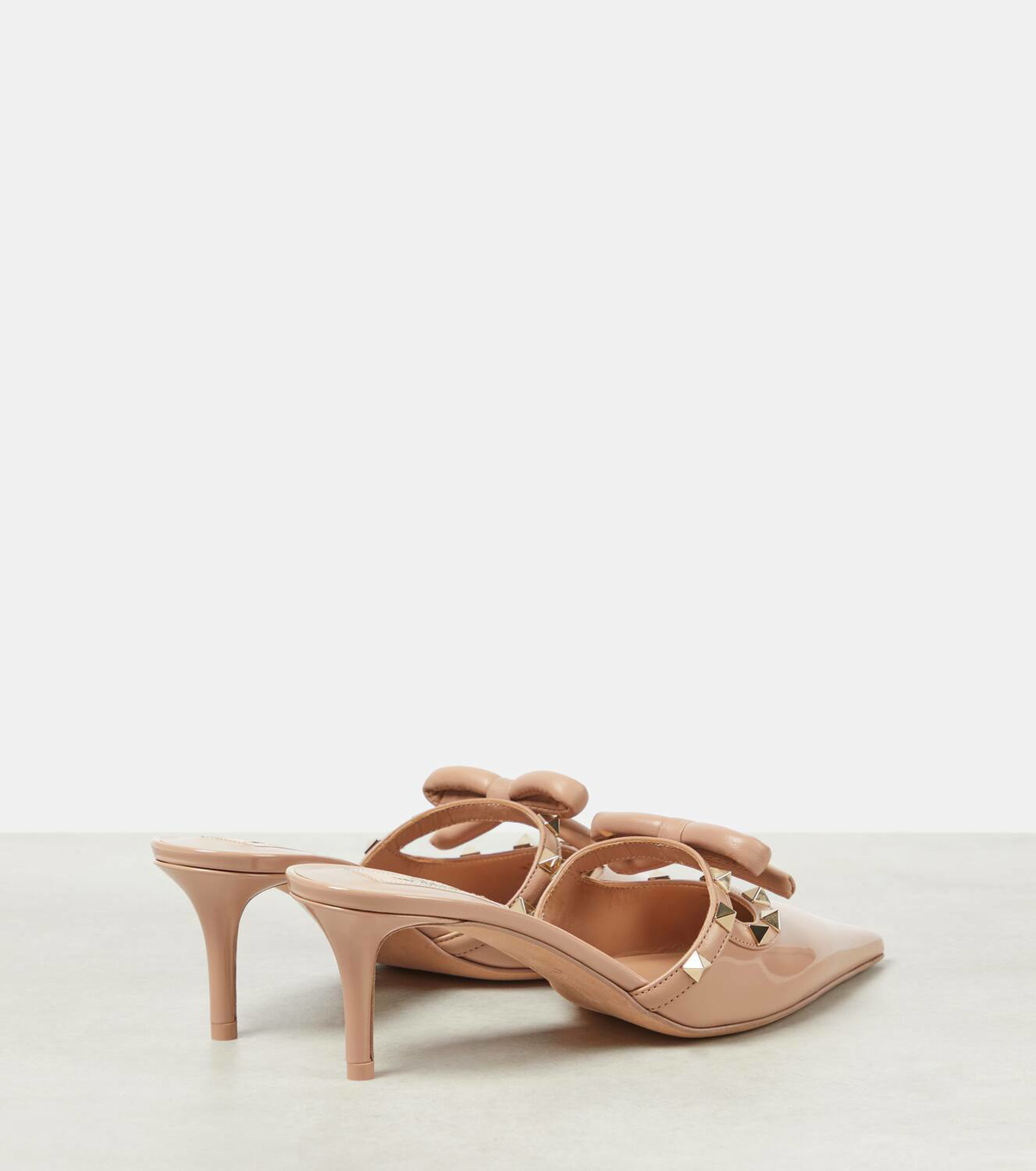 Valentino Garavani Rockstud bow-detail patent leather mules