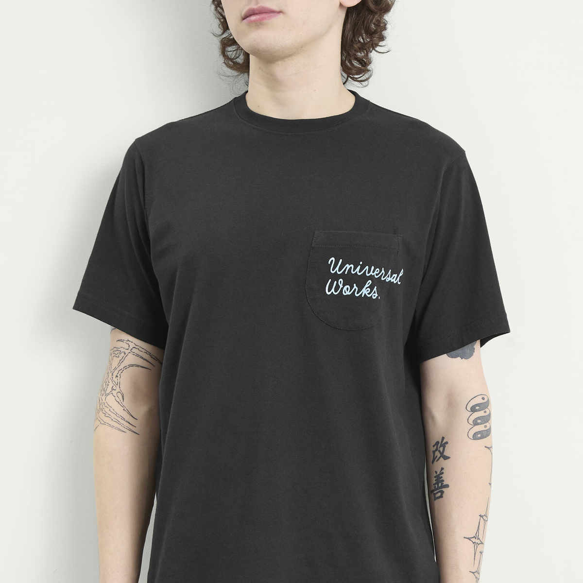 Universal Works Men's Script Logo Pocket T-shirt in Black