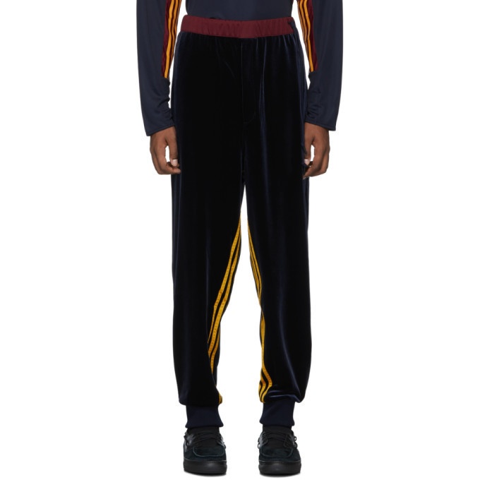 Photo: BED J.W. FORD Blue adidas Originals Edition Velour Track Pants