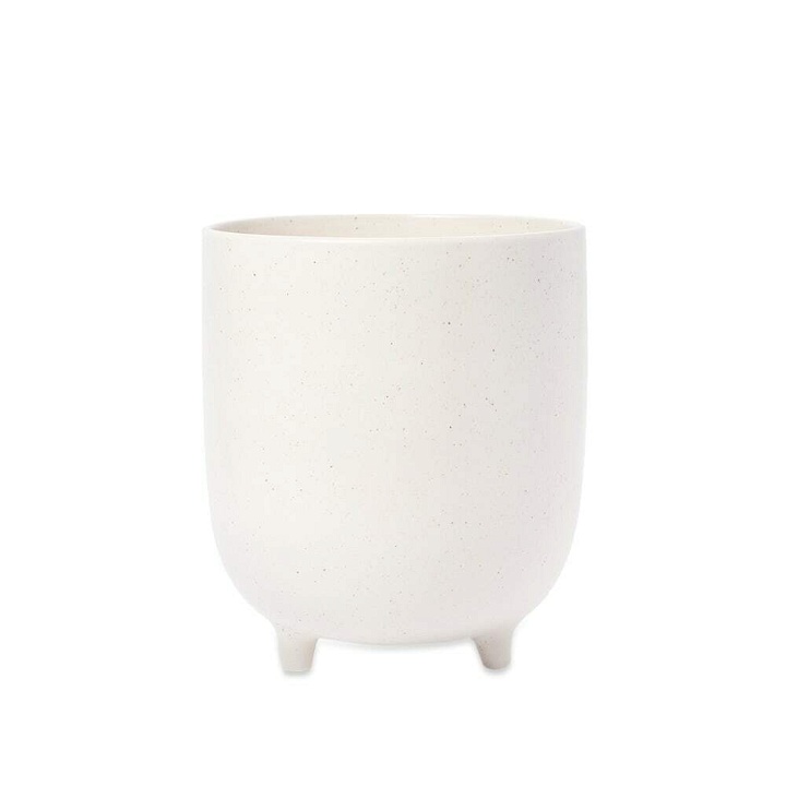 Photo: The Conran Shop Piede Footed Speckle Plant Pot in Natural
