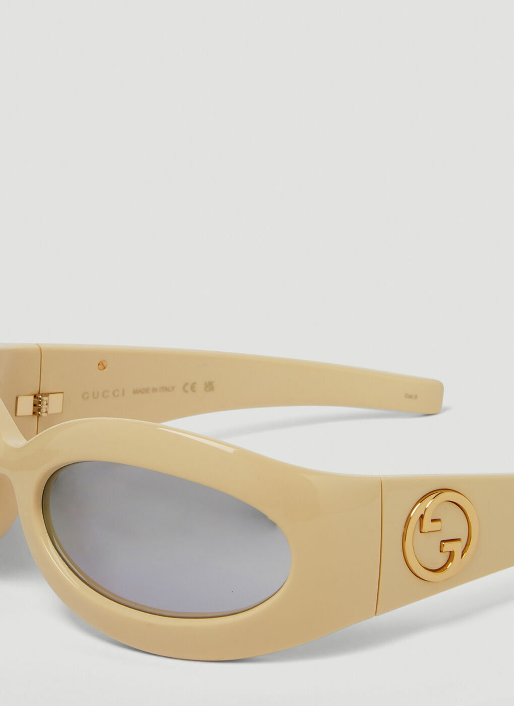 Gucci rectangular wrap-around sunglasses in black acetate.