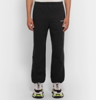 Balenciaga - Tapered Logo-Print Loopback Cotton-Jersey Sweatpants - Black