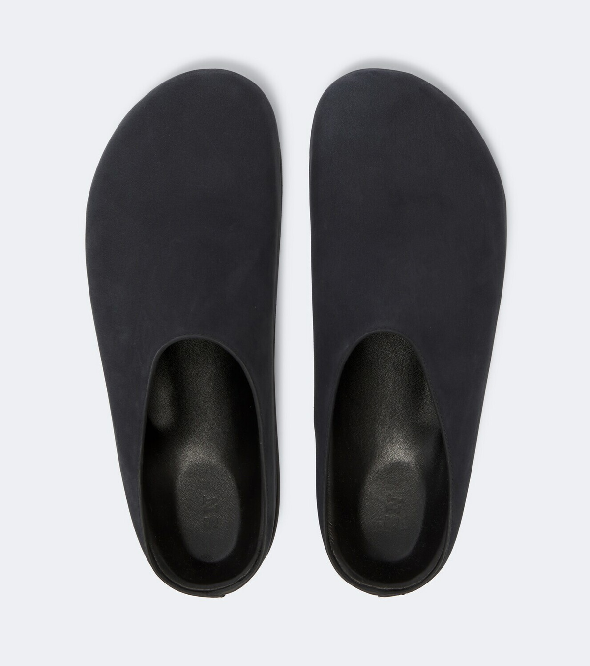 Studio Nicholson Wearing leather mules
