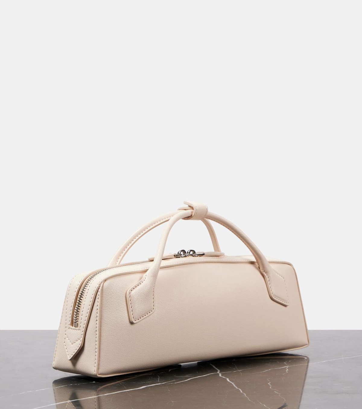 Alaïa Teckel leather clutch ALAÏA