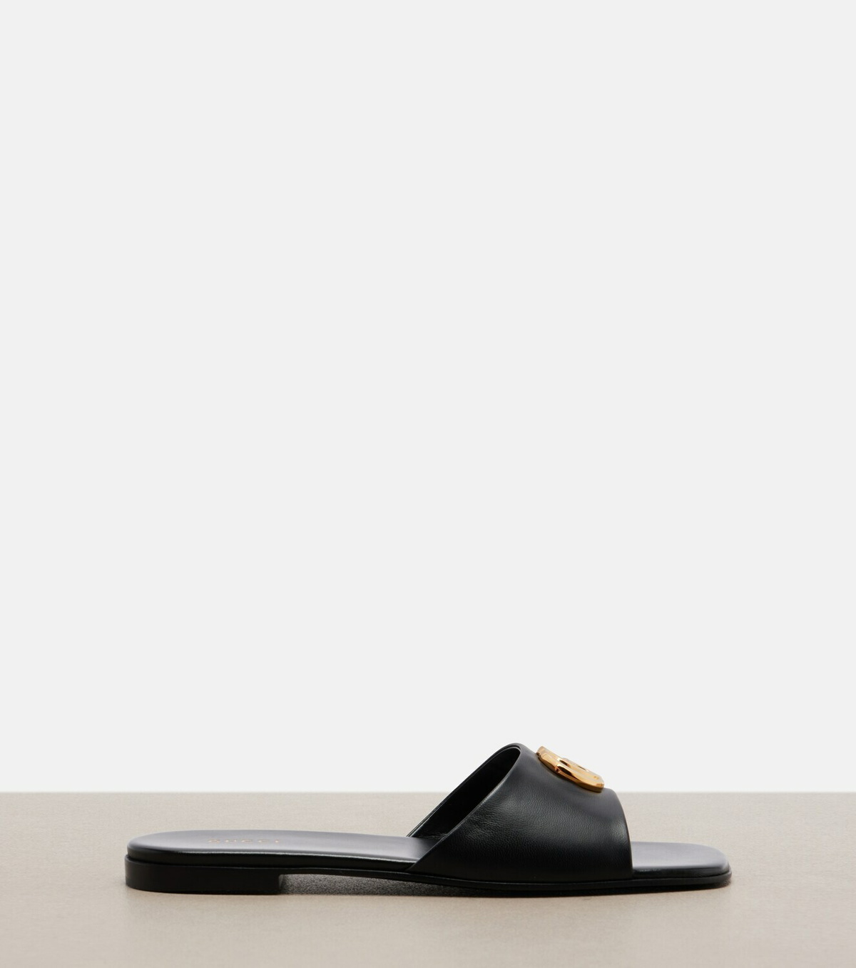 Gucci Double G leather slides