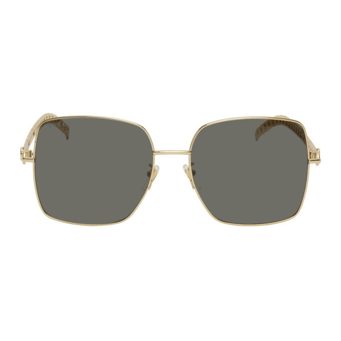Photo: Gucci Gold and Black Runway Chains Sunglasses
