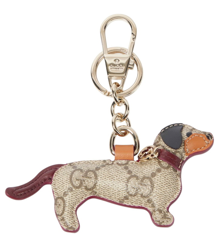 Photo: Gucci GG Canvas leather-trimmed keychain