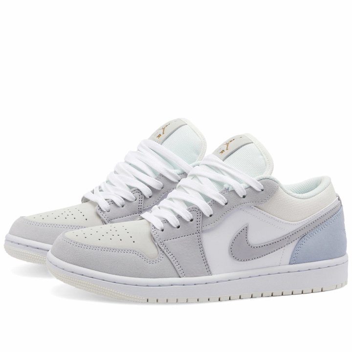 Photo: Air Jordan 1 Low FW in Grey/White/University Blue